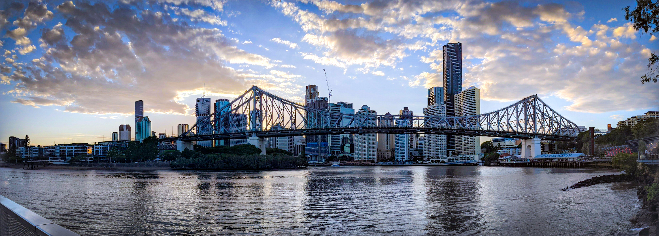 Panoramic sunset shot of the Storey Bridge and Brisbane CBD