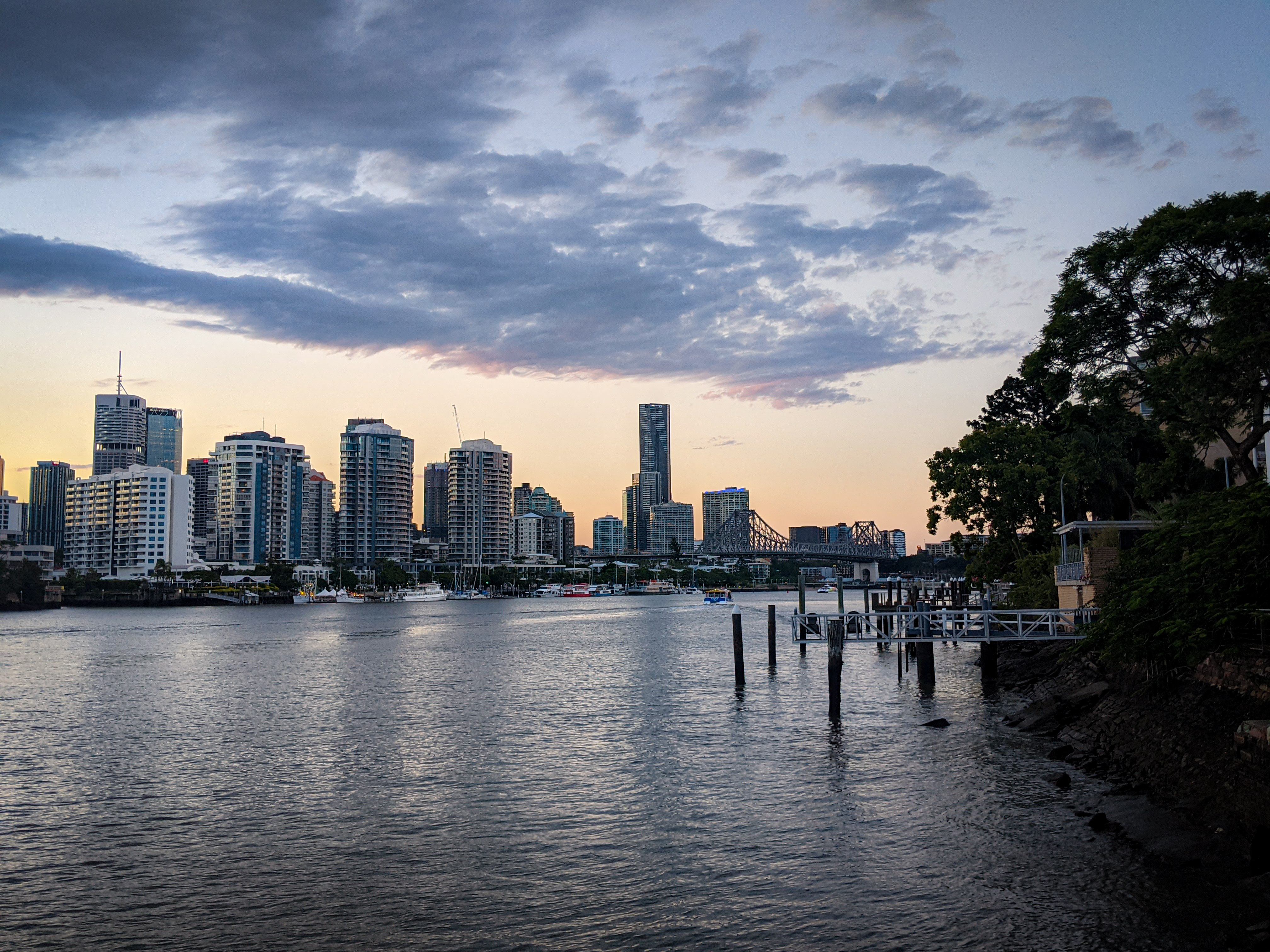 Close to the end of the New Farm Riverwalk looking back to the Brisbane CBD